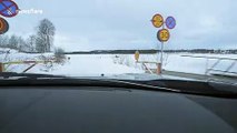 Swedish driver takes daring first trip across frozen lake ice road