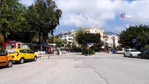 Turistik kent Alanya tarihi sessizliğini yaşıyor...Caddeler, sokaklar ve sahiller boş kaldı