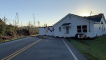 Storm rips home off foundation and onto road