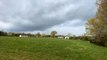 Tornado-warned storm looms ominously overhead