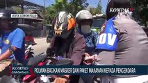 Polwan Gorontalo Bagikan Masker dan Paket Makanan Kepada Pengendara