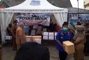 BUPATI TANJUNG JABUNG BARAT SERAHKAN BANTUAN APD