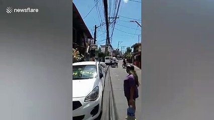 Locals dance with coffin as bizarre COVID-19 deterrent in the Philippines