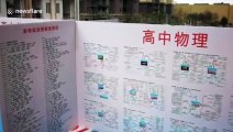 Boards covered in general knowledge used to separate students at Chinese school during COVID-19 pandemic