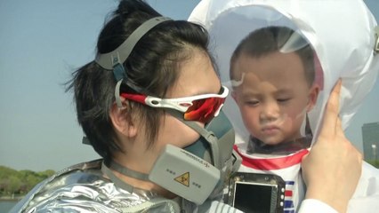 Chinese dad customises inflatable suit to protect son from coronavirus