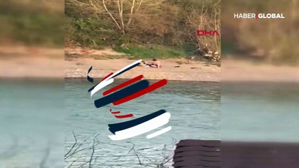 Irmak kenarında güneşlenmeye koronavirüs cezası