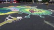 Indian artists paint coronavirus graffiti on roads to encourage people to stay home