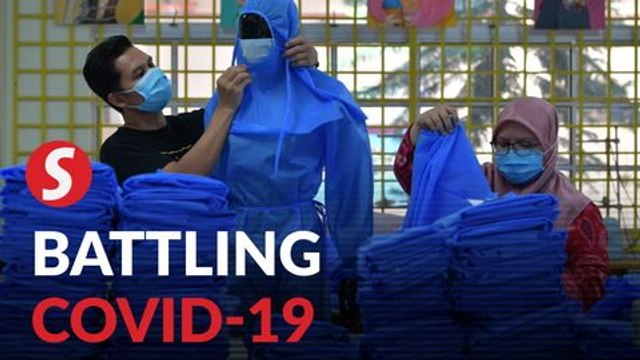 Students and volunteers at Johor polytechnic making PPE for frontliners