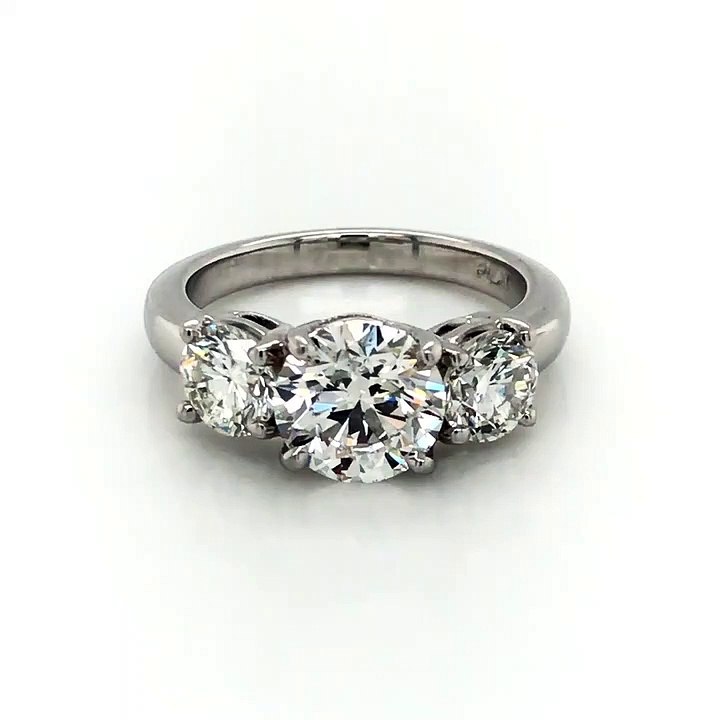 Three Stone Diamond Engagement Ring in Platinum with A GIA Certified 1.70ct. H Color SI1 Clarity Round Center