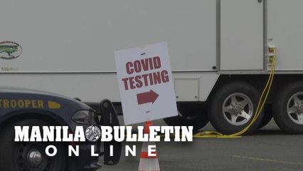People arrive for testing at drive-through Covid-19 facility in minority area in Brooklyn