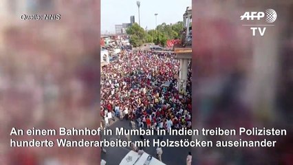 Polizei treibt Wanderarbeiter in Indien mit Holzstöcken auseinander