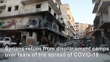 Displaced Syrians go home to ruins rather than risk virus