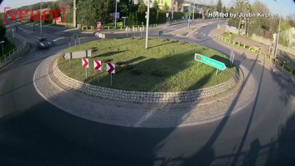 Watch Car Careen Over Roundabout & Fly into the Air in Shocking CCTV Footage