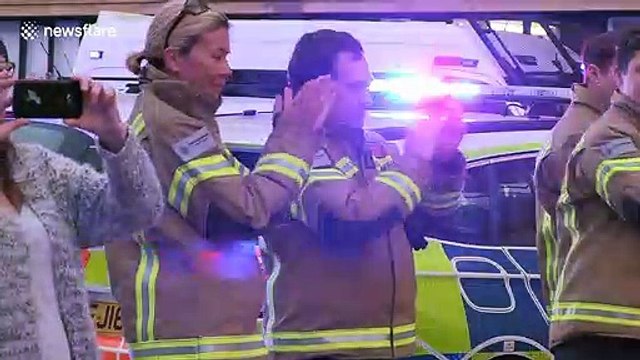 Police, fire, rescue and NHS workers line up to clap for those on front lines of coronavirus fight