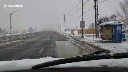 Snowy weather impacts driving conditions in Colorado