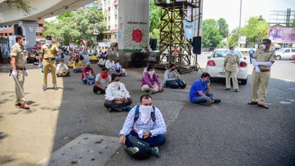 Hungry students of Manipur sits on the road waiting for food