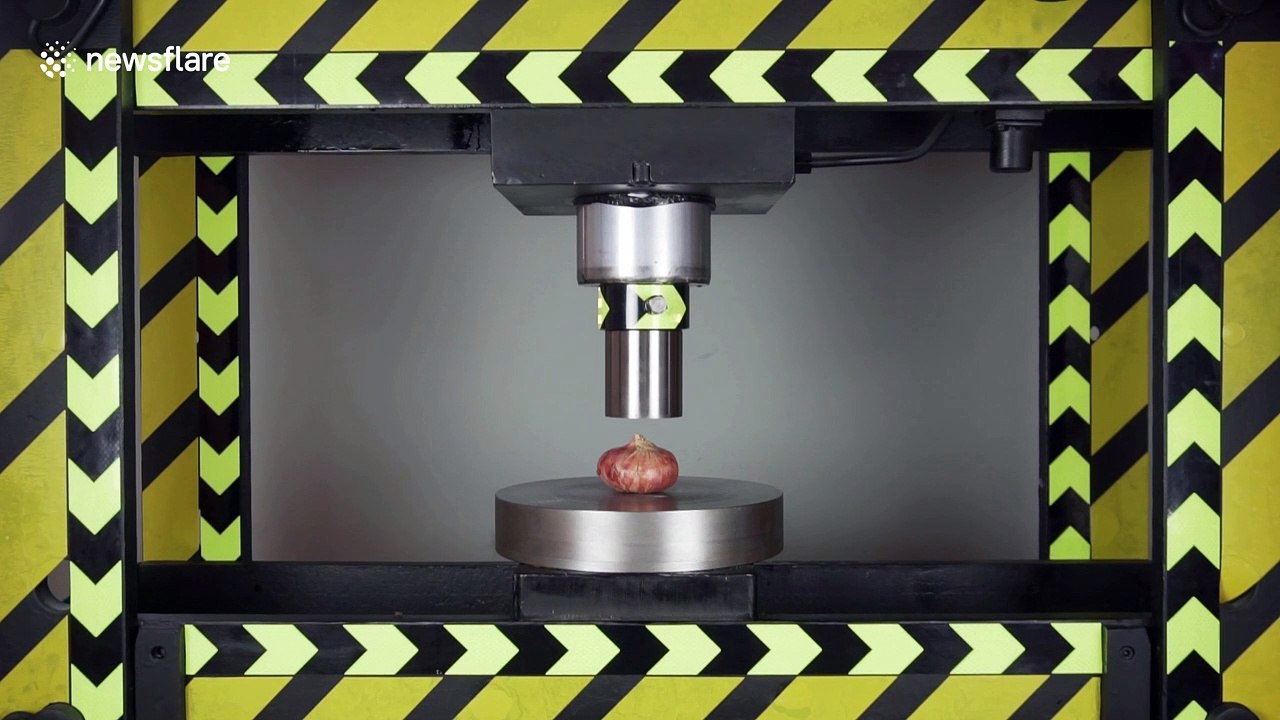 Hydraulic press makes light work of random objects