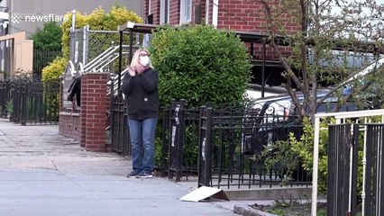 New Yorkers applaud health workers and first responders from home