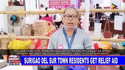 Surigao del Sur town residents get relief aid