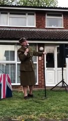 Leighton Buzzard woman sings on her front garden to lift morale on her road