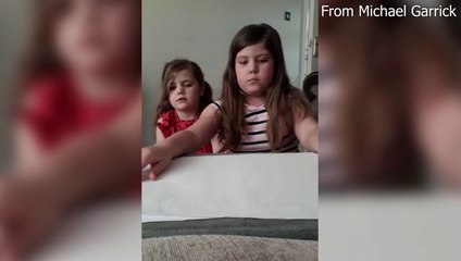 The daughters of Richmond Taxis driver Michael Garrick showing their thanks for key workers