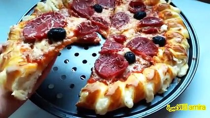 بيتزا بالعجينة السحرية لي تعطيها خفة و بنة ..اسرار لاول مرة رايحة تشوفيها ..فيديو مفصل