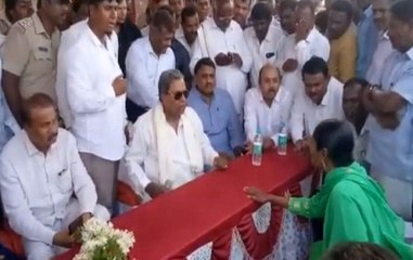 Siddaramaiah loses cool, snatches mic from woman party worker