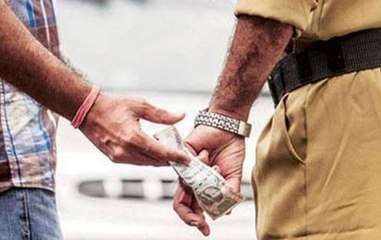 Caught on camera: UP Police officer allegedly takes bribe