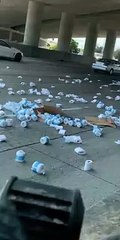Truck Drops Multiple Boxes of Toilet Paper on Freeway