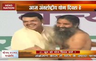 Watch: Ramdev performs trademark asanas with CM Fadnavis in Nanded