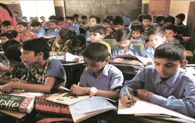 MLA Rekhchand Jain teaches students in Jagdalpur's Naxal-hit area
