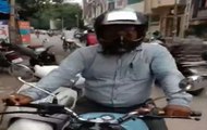 Astonishing!! This Man Fixes Documents In Helmet To Evade Challan