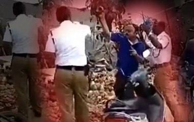 Did Scooty Driver Thrash Traffic Police For Issuing Challan?