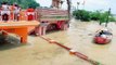 Watch: Prayagraj Woman Swims Through Floodwater, Offers Prayers