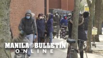 Residents in one of New York's hardest-hit areas line up for food