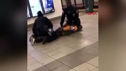 ABD'de polise ‘koronavirüslü’ saldırı! Tükürdü, raylara itti