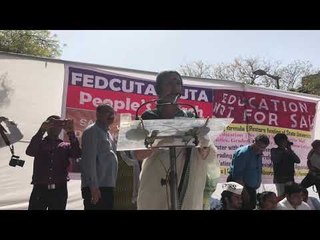 Brinda Karat talking to protesters who took out the march for education