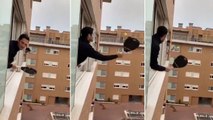 Viral Video : Watch How Two quarantined People playing Tennis Across Apartment Windows