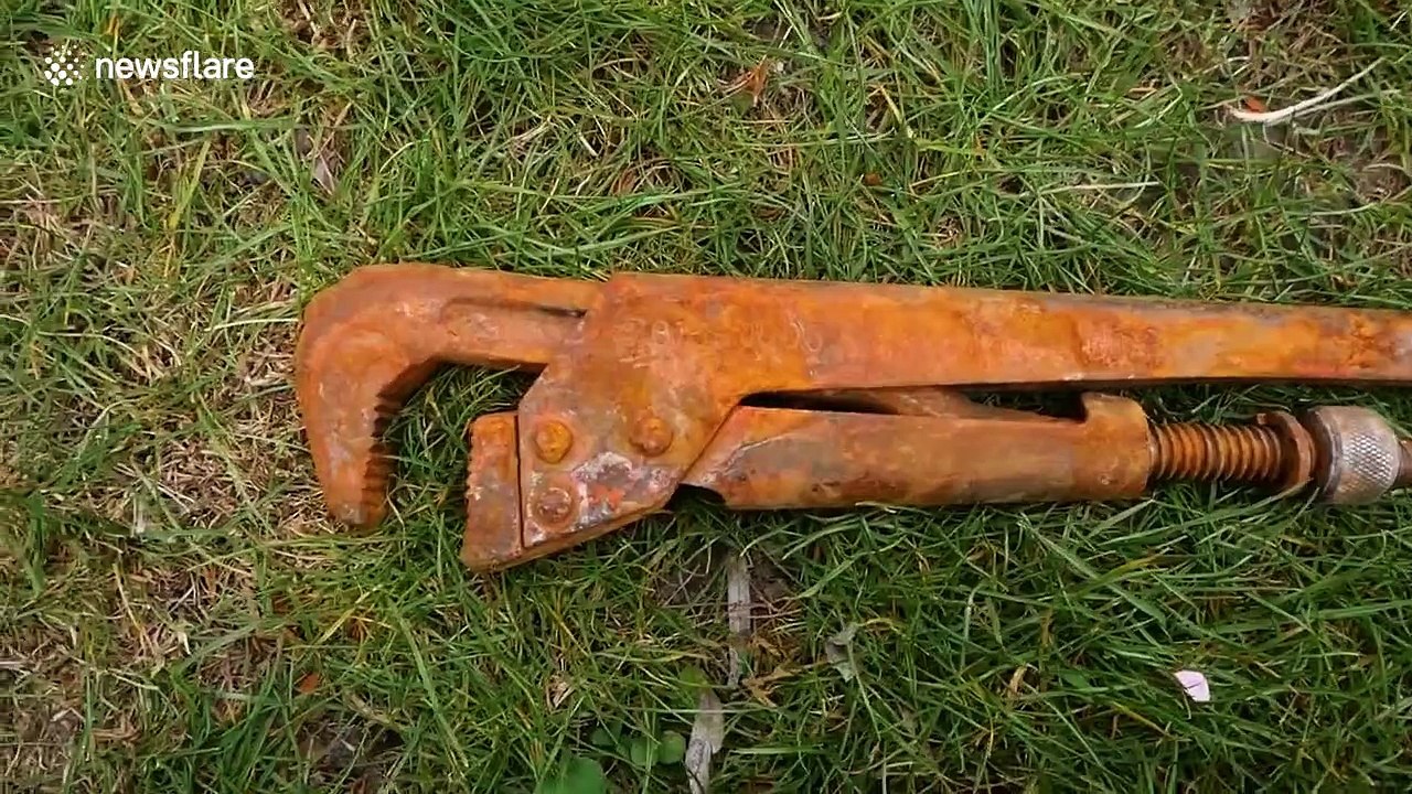 Rusty old wrench restored into a brand new looking tool