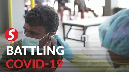 Singapore hits daily record high of new 1,426 Covid-19 cases