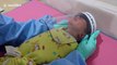 Newborn babies wear face shields to protect them against coronavirus at Indonesian hospital