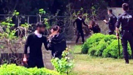 Boşanma aşamasında olduğu eşi, genç kadının boğazına mezarlıkta bıçak dayadı