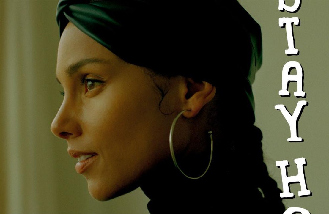 Alicia Keys wrote 'Girl on Fire' to give herself a 'push'