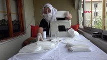 DÜZCE Evinde maske dikip, mahalle halkına dağıtıyor