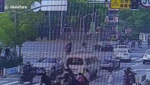 Chinese policeman stops driverless car after it threw motorist out onto road