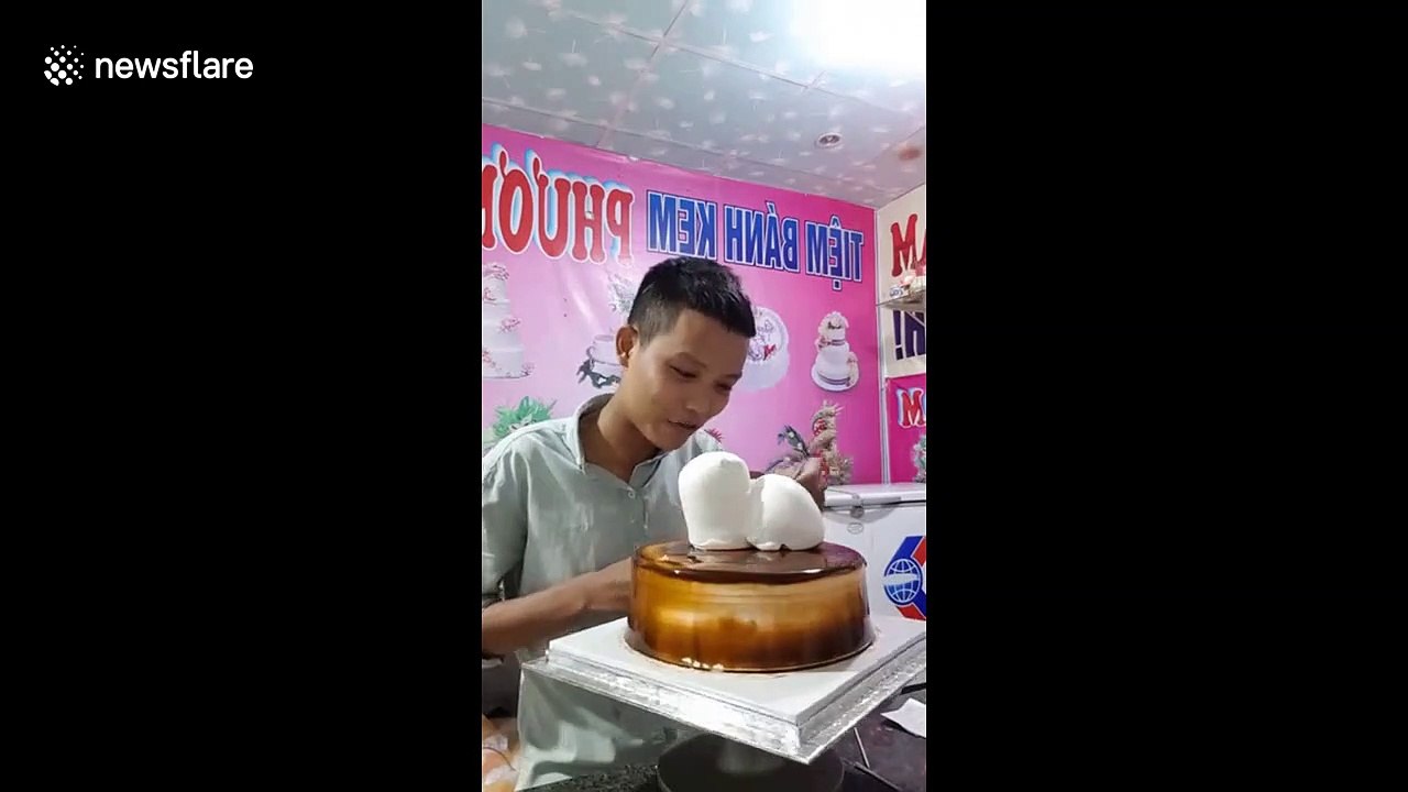 Vietnamese baker creates cute dog-themed cream cake