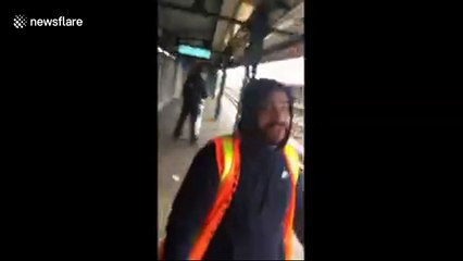 Shocking moment MTA worker attacks passenger after being caught spitting on the tracks