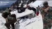 Indian army rescues government official and his driver after they were trapped in an avalanche