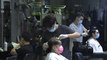 Singaporeans rush to get haircuts ahead of extension of coronavirus lockdown
