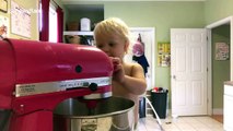 Adorable moment 2-year-old tries baking cookies for the first time